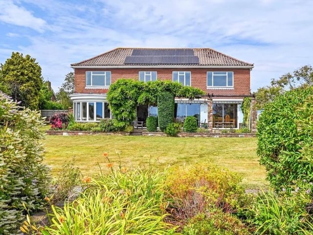 This home has five bedrooms, three reception rooms and two bathrooms.