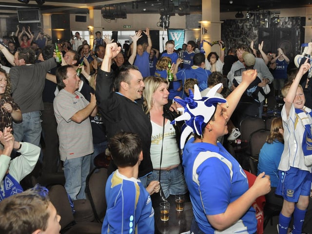 Celebrating victory in the pub!PICTURE: MICHAEL SCADDAN