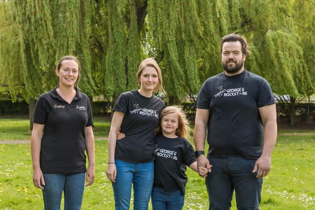 The team behind music therapy at QA Hospital. From left: music therapist Cathy Birch, and Amy O'Shaughnessy with daughter Isabella (6) and husband Craig O'Shaughnessy. Picture: Mike Cooter (110521)