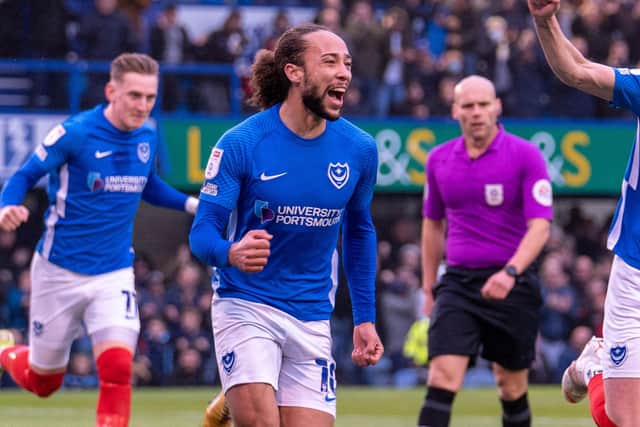 Marcus Harness celebrates his 11th-minute opener against Morecambe. Picture: Stephen Flynn/ProSportsImages