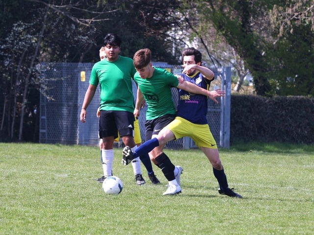 Action from the Challenge Cup clash between Pelham Arms (blue/yellow kit) and FFTP (green and black kit). Picture: Sam Stephenson