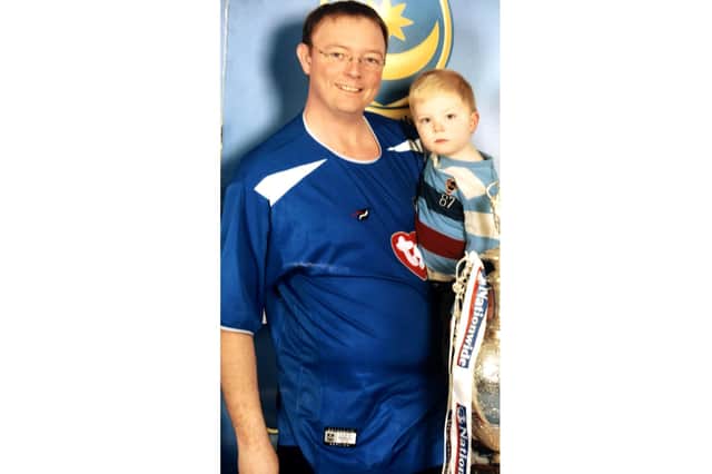 Mark Hancock with his son Matthew in 2003 when he weighed 16 stones.
