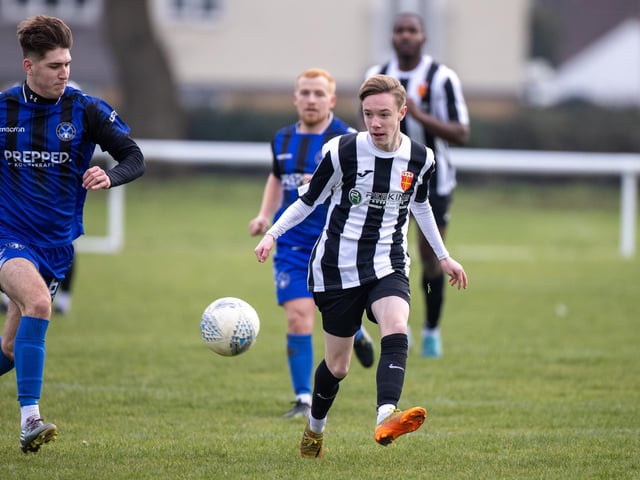 Hayling United (black/white) v Clanfield. Picture by Alex Shute