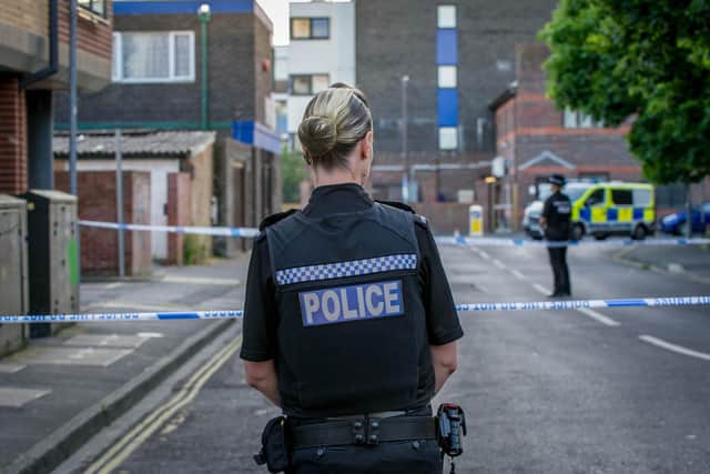 Police presence outside Mulberry House, Before Street Portsmouth on 28 May 2020. Picture: Habibur Rahman