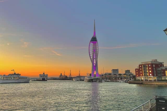 The Spinnaker Tower, illuminated with purple light to mark the end of Stroke Awareness Month.