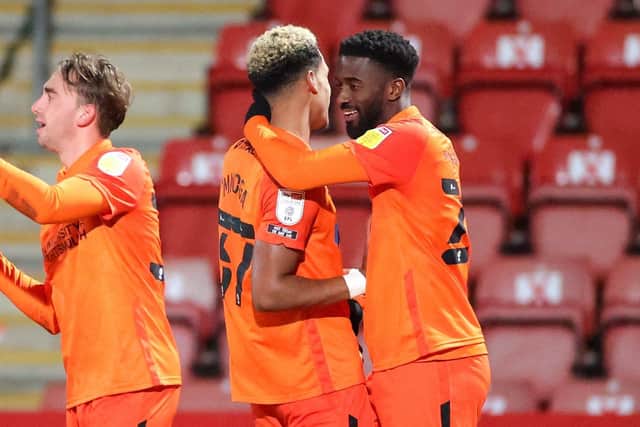 Jordy Hiwula, right, celebrates with fellow goalscorer Haji Mnoga