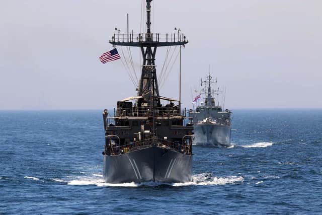 Portsmouth-based minehunter HMS Brocklesby, rear, pictured with USS Gladiator, of the US Navy, during a drill in the Gulf. Photo: Royal Navy
