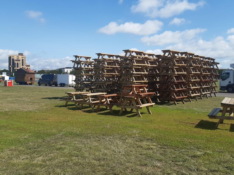 A large number of benches have been delivered with the new site layout giving extra space for festival goers to spread out between the main stage and the food and drink area