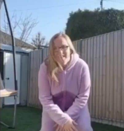A teacher from Lyndhurst Junior School dances dressed as a unicorn.