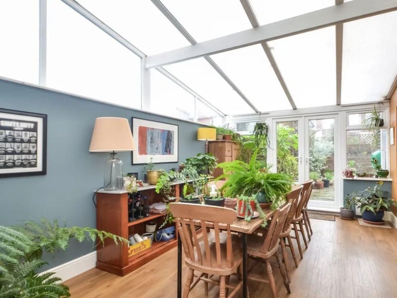 The listing says: "This impressive corner residence was built in the Edwardian period and captures a number of features including a turret double storey bay window, cast iron canopy, ceiling roses and coving and fire surrounds. The property has two primary floors to the front and three mezzanine levels to the rear and includes a basement playroom and store."
