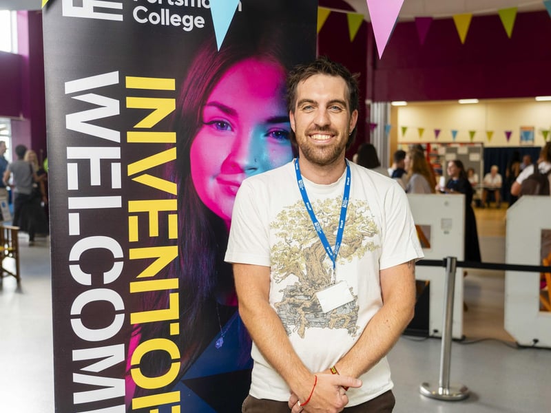 Gary Street,  music production lecturer, welcomes students to City of Portsmouth College results day 2024.