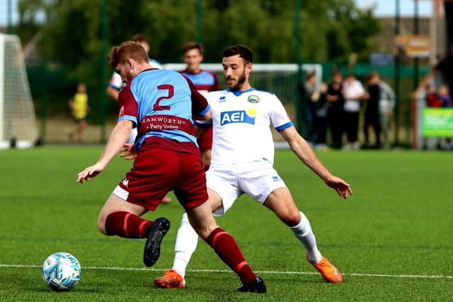 Brad Tarbuck, right, in action for Gosport at Hamworthy. Picture by Tom Phillips.