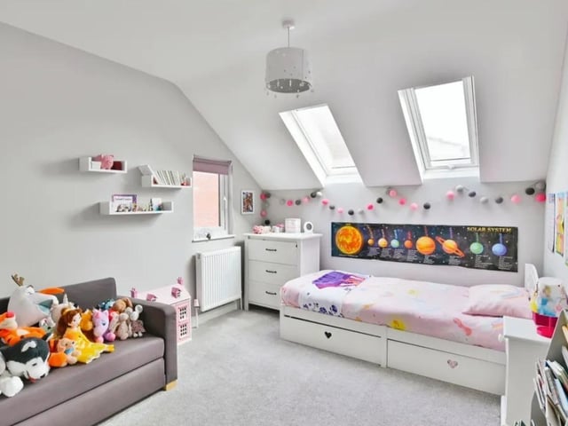 This property comes with five bedrooms, four bathrooms and three reception rooms as we as an open-plan kitchen, spacious garden and off-road parking.
