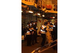 HMS Diamond's sailors get ready to launch the ship's seaboat to help the yacht on Thursday, November 10, 2022