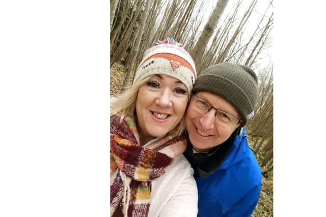 Angie Kennedy from Waterlooville has set up a Facebook group called #Hit The Switch to encourage people to light up their neighbourhoods. Pictured: Angie with her husband Mike