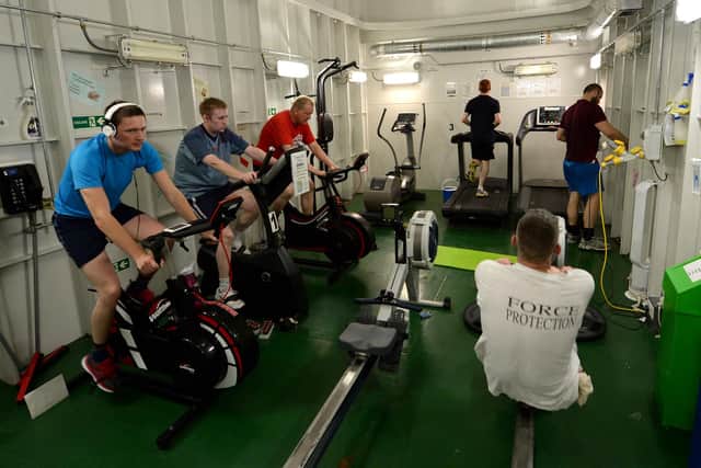 Members of HMS Duncan pictured during a gym workout before the global pandemic hit the ship.
