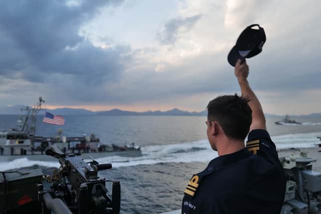 HMS Lancaster escorting USS Chinook and Monsoon.