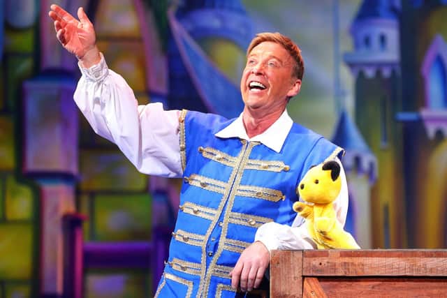 Richard Cadell as Buttons with Sooty. Picture by Stuart Martin/Mayflower Theatre