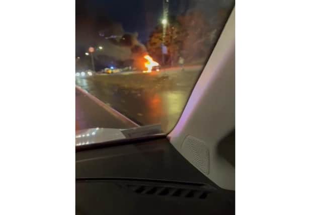 A car was 'engulfed in flames' in Anchorage Road, Portsmouth, yesterday evening. Firefighters rushed to the scene to extinguish the flames.