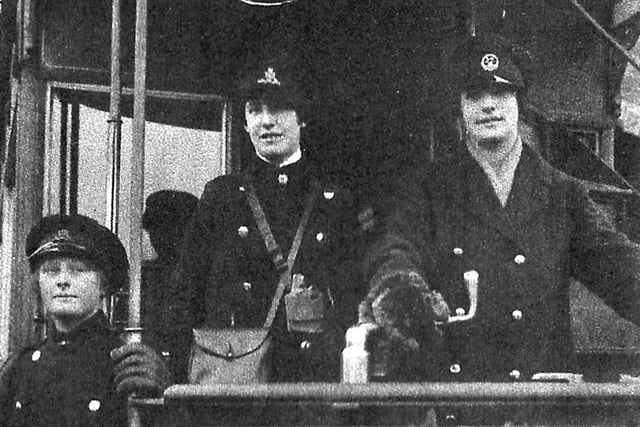 Helen Blacker at the tram controls. Seen back in 1919 are three girls who helped run trams in Gosport. Picture: Shirley Featherstone collection.