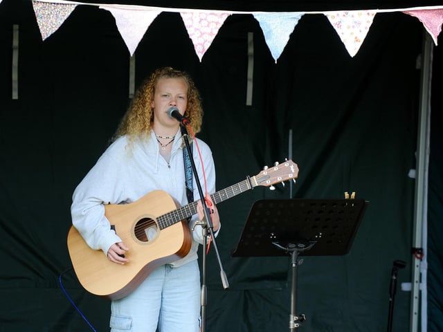 Pictured is: Fleur Ash performing on the acoustic stage. Picture: Sarah Standing (010923-1329)