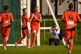 Brett Pitman celebrates one of his two first-half goals. Picture: Keith Woodland