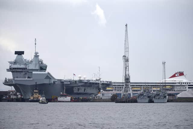 HMS Prince of Wales heading into Rosyth dock for repairs. Picture: LISA FERGUSON