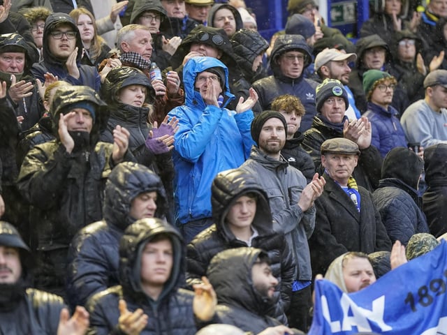 Pompey fans braved terrible weather conditions on New Year's Day to cheer the Blues to victory against Swansea.
