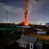 GAS explosions left mobile homes and a building on fire, and smoke could be seen billowing into the sky. The fire started on Claybank Road, at 10.30pm. Picture: Supplied