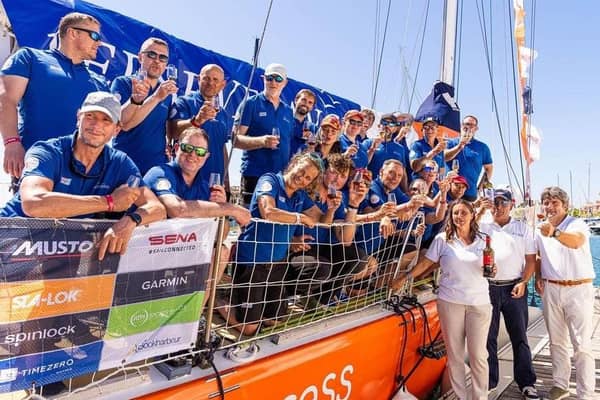The crew of Perserverence celebrate winning the opening race in the 2023/24 Clipper Round the World Race