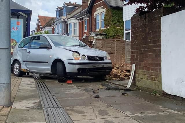 The mangled VW Polo in North End.