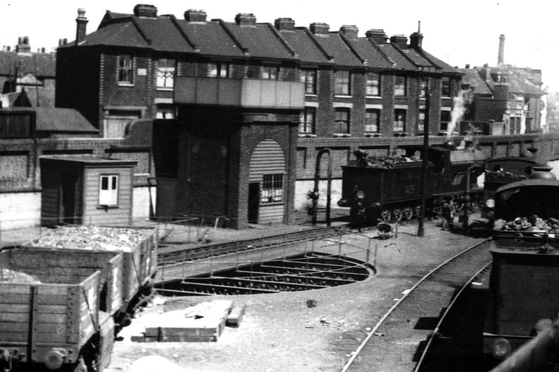 The former turntable outside Portsmouth & Southsea station in the 1930's. Canal Walk is behind the wall.