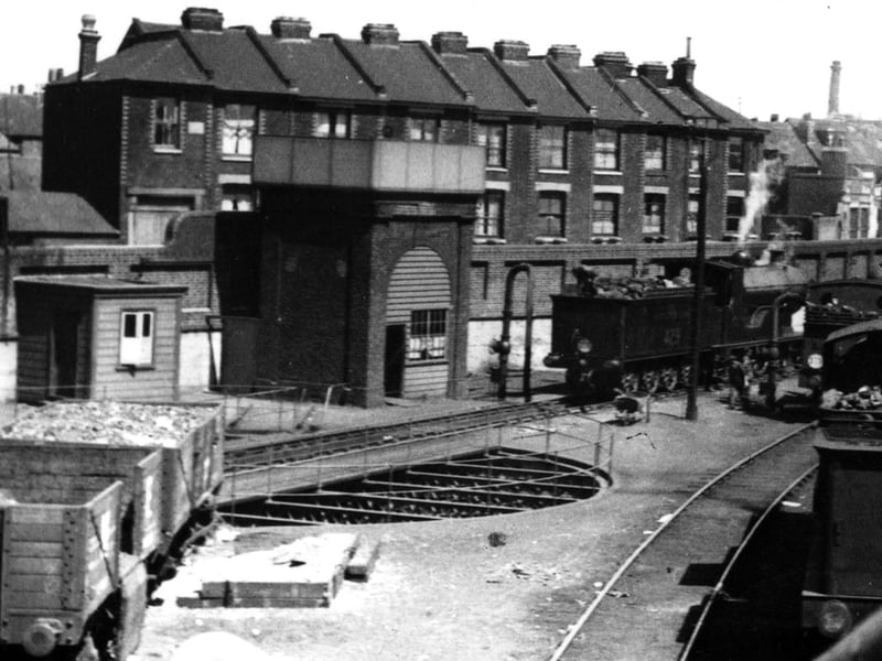 The former turntable outside Portsmouth & Southsea station in the 1930's. Canal Walk is behind the wall.