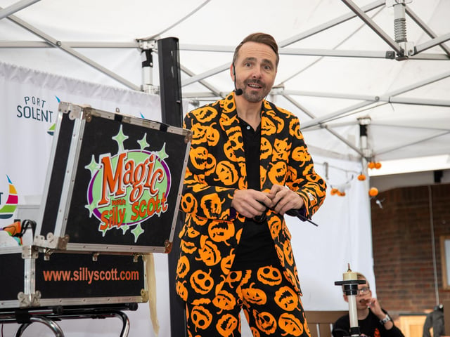 People flocked to Port Solent on Thursday to enjoy the half term entertainment, including arts and craft, face painting and magic shows.Pictured - Silly Scott performing his magic showPhotos by Alex Shute