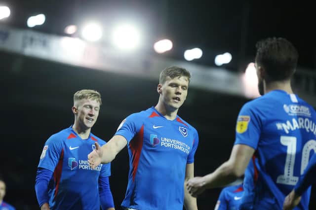 Sean Raggett is remaining to lead Pompey's play-off challenge following a dramatic day at Fraton Park. Picture: Joe Pepler