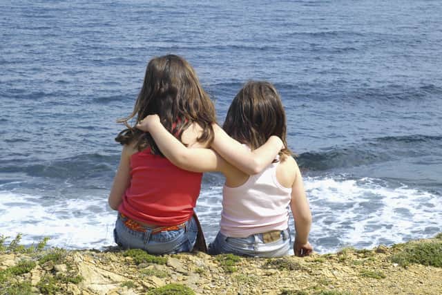 An adoption service is celebrating finding homes for three children