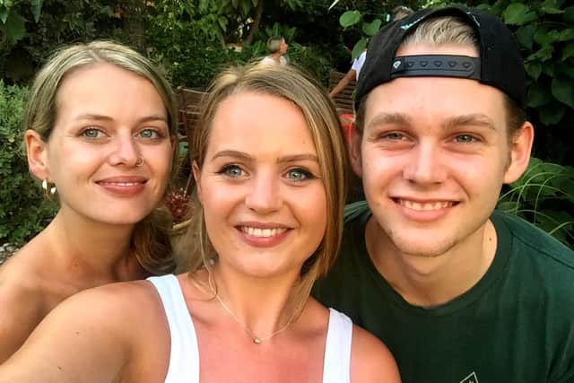 The three siblings together in 2018. From left: Lily, Joely and Daniel Pullen.