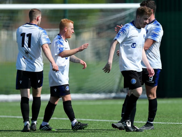 Clanfield's Harvey Cooper, second left, celebrates scoring his side's opener. Picture: Chris Moorhouse