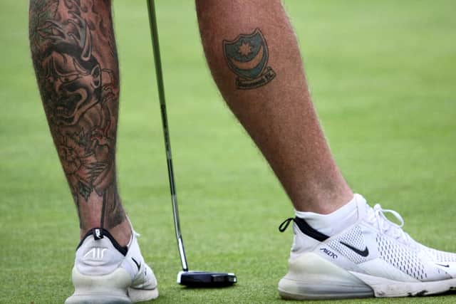 The Pompey tattoo on the back of Sam Parsons' leg. Picture by Andrew Griffin
