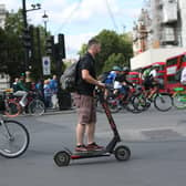 A person riding an electric scooter in Westminster, London. Picture: Yui Mok/PA Wire