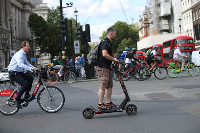 A person riding an electric scooter in Westminster, London. Picture: Yui Mok/PA Wire