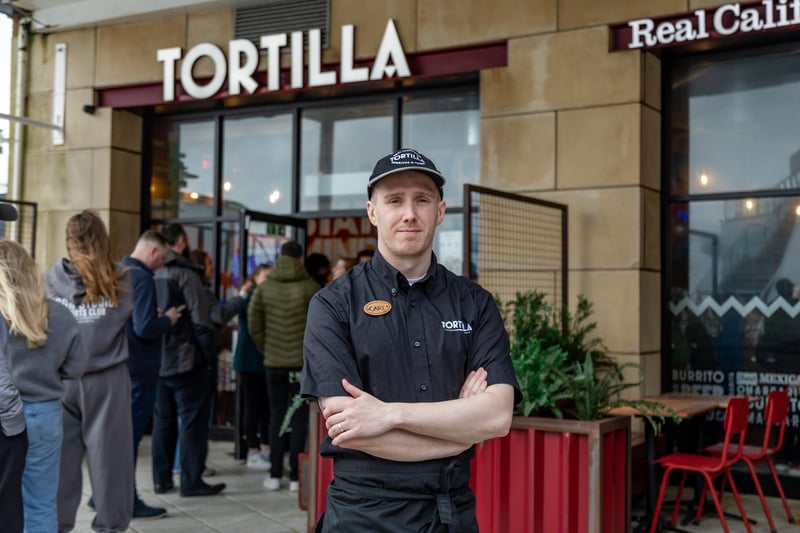 Store Manager Carl Cramman (33) at Tortilla in Gunwharf Quays where the burrito giveaway took place.Picture: Mike Cooter