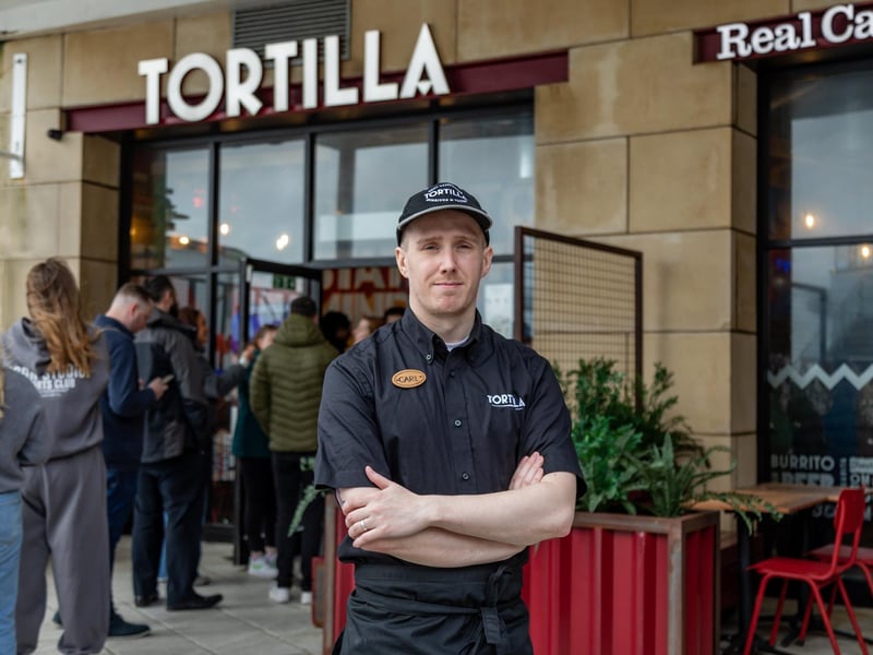 Store Manager Carl Cramman (33) at Tortilla in Gunwharf Quays where the burrito giveaway took place.Picture: Mike Cooter