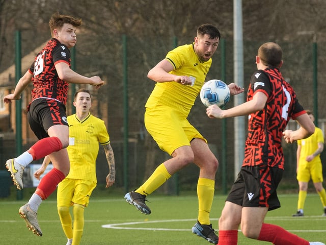 Action from Harvest's 4-1 win at home to Locks Heath (red and black kit) in the Hampshire Premier League. Picture: Keith Woodland (180321-1508)