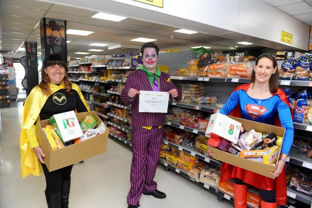 From left, Hayley Barnett, Josh Shadbolt and Diana Hill at the Co-Op store in Copnor Road, Portsmouth. Picture: Sarah Standing (220520-8953)