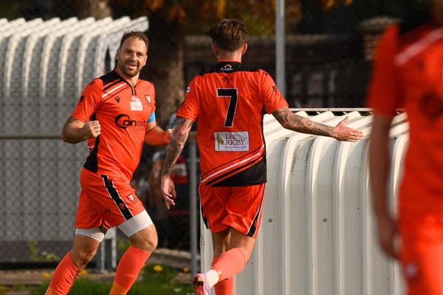 Brett Pitman, left, celebrates one of his 20 goals for AFC Portchester so far this season.
Picture: Keith Woodland