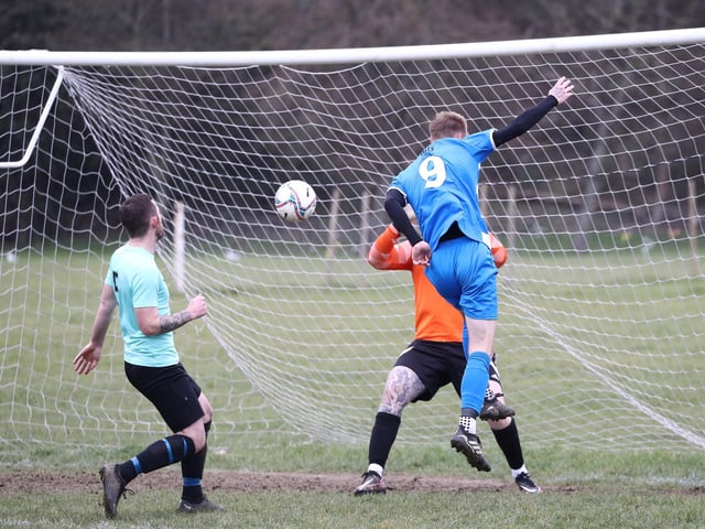 Barry Jeans heads in AC Copnor's second goal. Picture: Stuart Martin