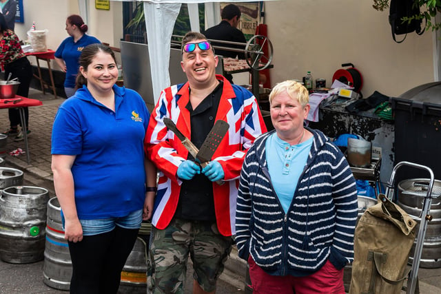 Part of the team at The Phoenix who organised the hugely popular Jubilee street party in Duncan Road. Pictured: Sarah Etherington (32), chef Phil Etherington (34) and Kath Birch (56) who has been the landlady at The Phoenix for 20 years. Picture: Mike Cooter (050622)