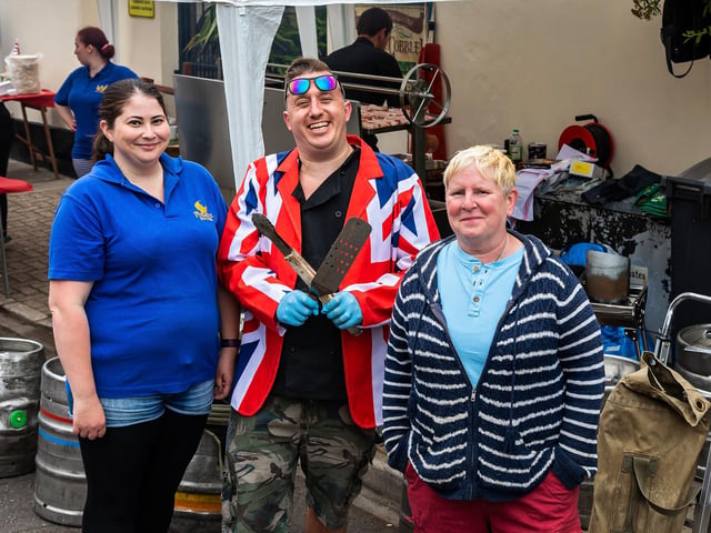 Part of the team at The Phoenix who organised the hugely popular Jubilee street party in Duncan Road. Pictured: Sarah Etherington (32), chef Phil Etherington (34) and Kath Birch (56) who has been the landlady at The Phoenix for 20 years. Picture: Mike Cooter (050622)