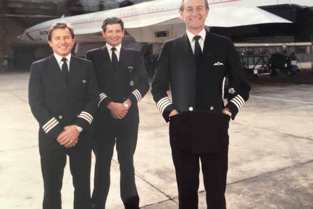 Captain John David Butterly (right) getting ready to take the controls of Concorde.